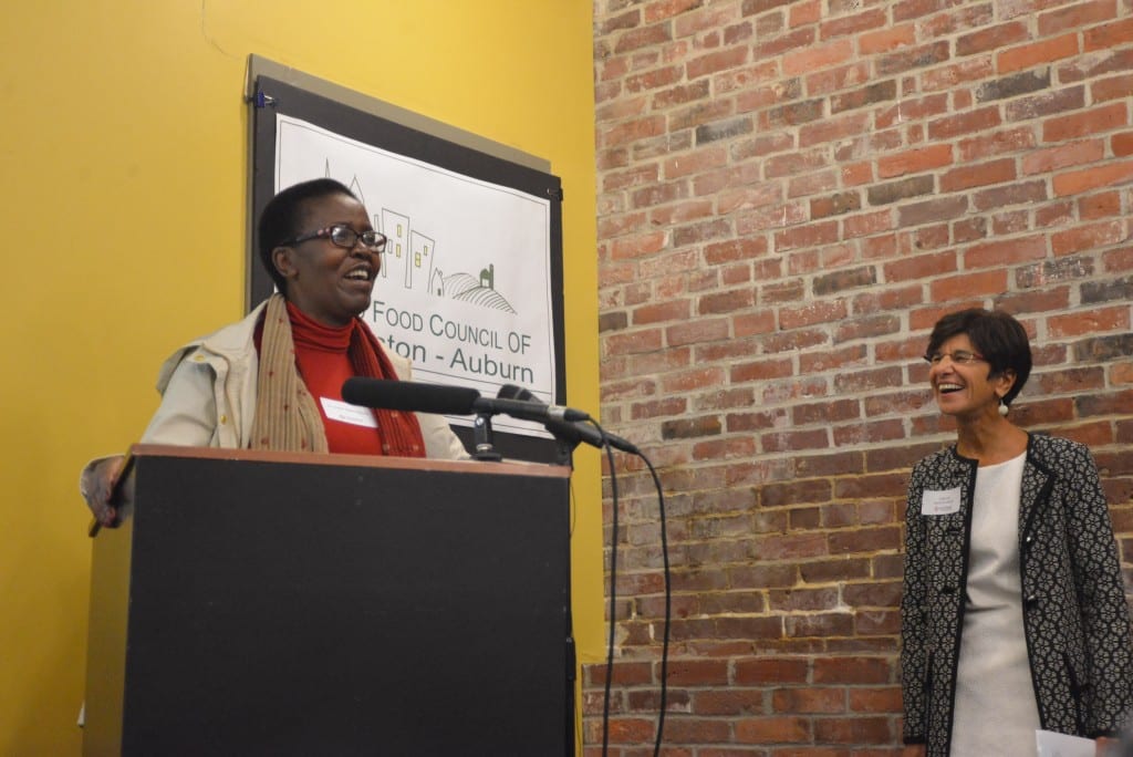 Dr. Lindiwe Majele Sibanda and Catherine Lee share a laugh at the Lewiston-Auburn Community Food Charter launch event. Sibanda and Lee, of Maine Law's Justice for Women Lecture Series, join the Good Food Council of Lewiston-Auburn to celebrate the launch.